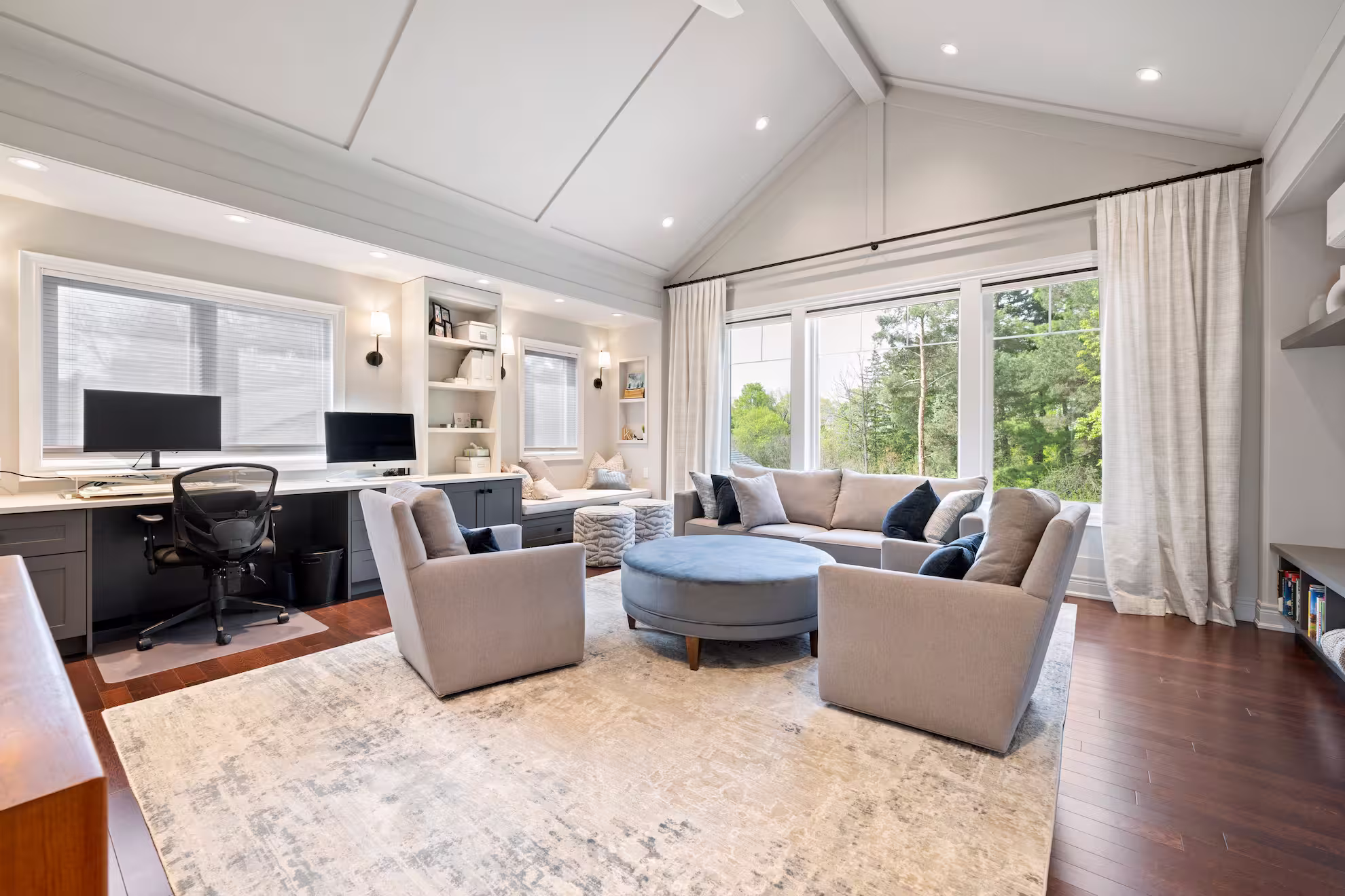 Vaulted room with a wall of windows and built-in desks, Waterdown second-storey addition