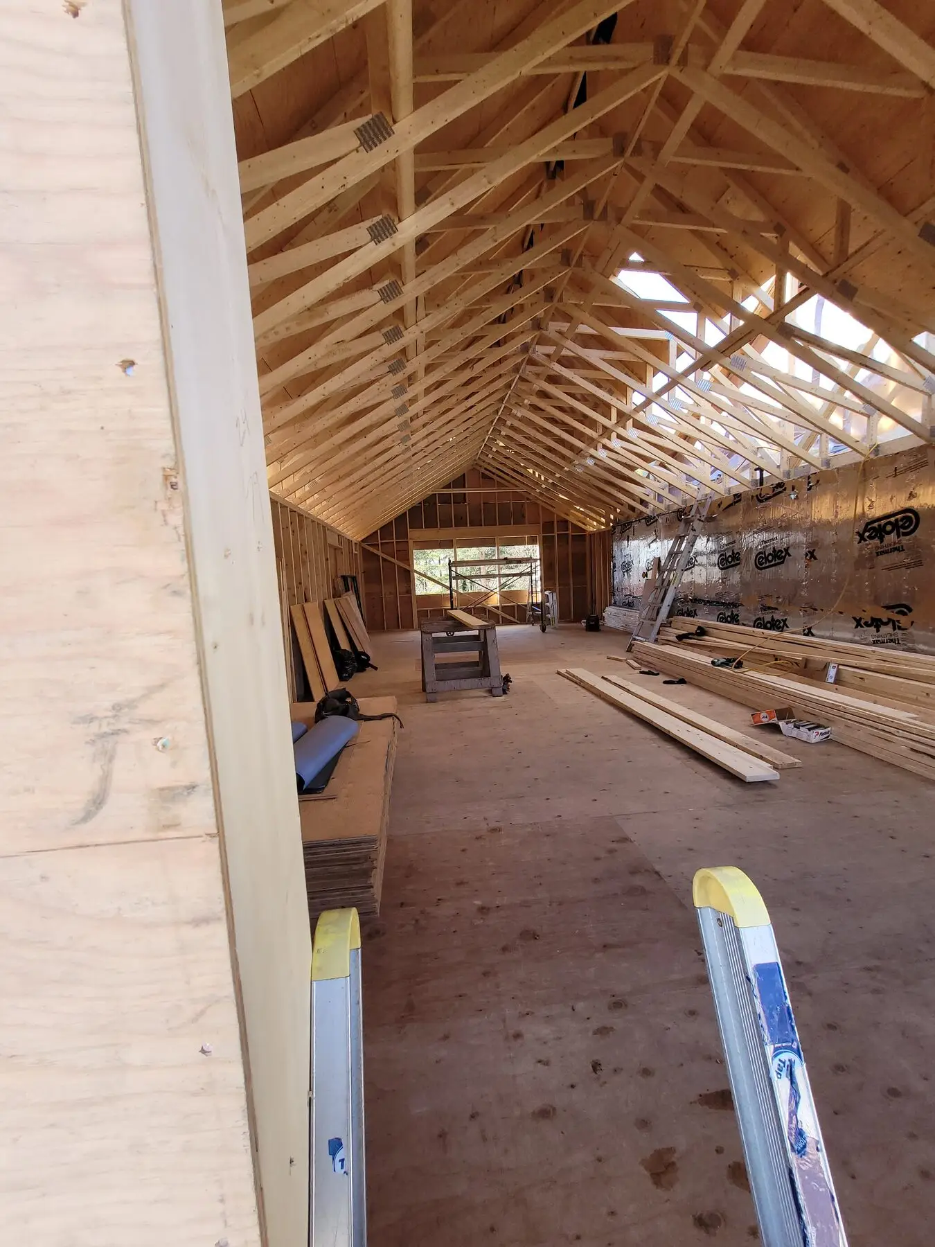 New second-storey framing and roof trusses under construction on the Waterdown home