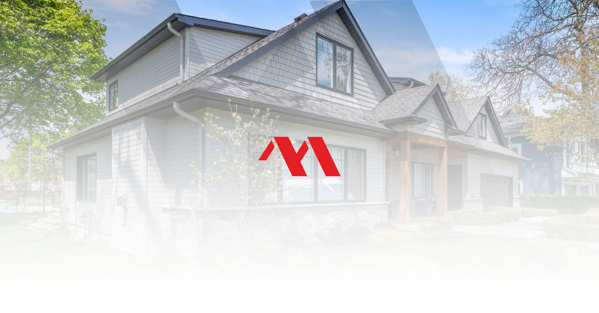 White two-storey Burlington home with a covered front porch, with the Marcon Construction mark overlaid